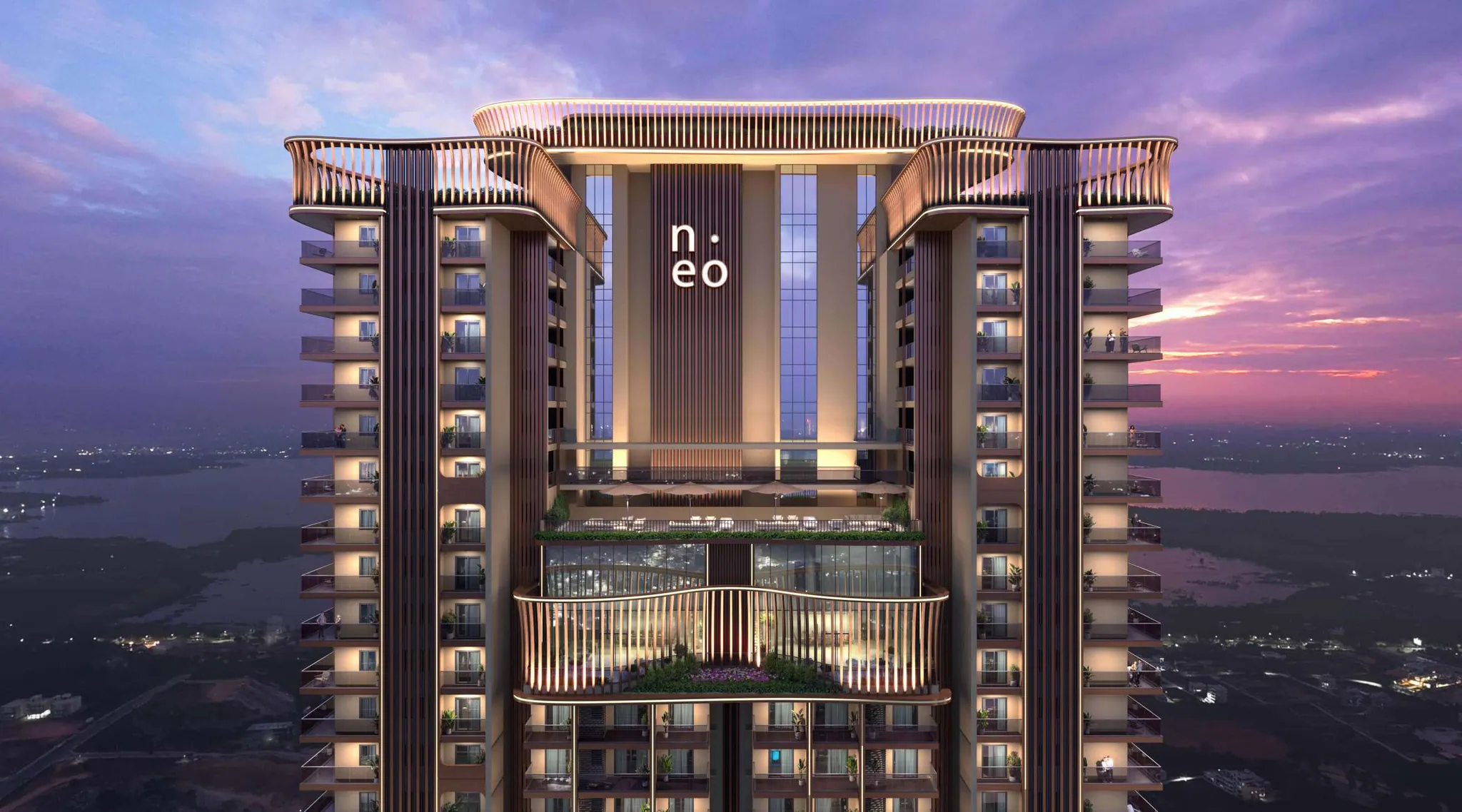 The lit crown of NEO at dusk, home to the Sky Office on levels 48 and 49